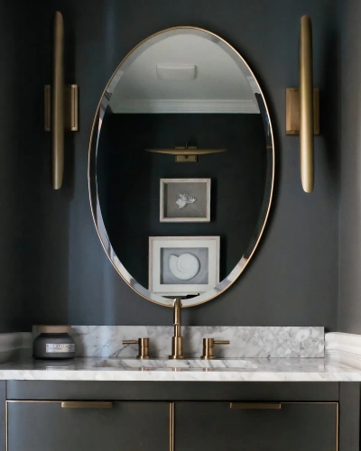 Золотое овальное зеркало "Хоган"